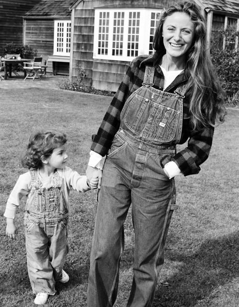 <p>The ever-elegant Ricky Lauren, with daughter Dylan, outside her East Hampton home, 1977.</p>