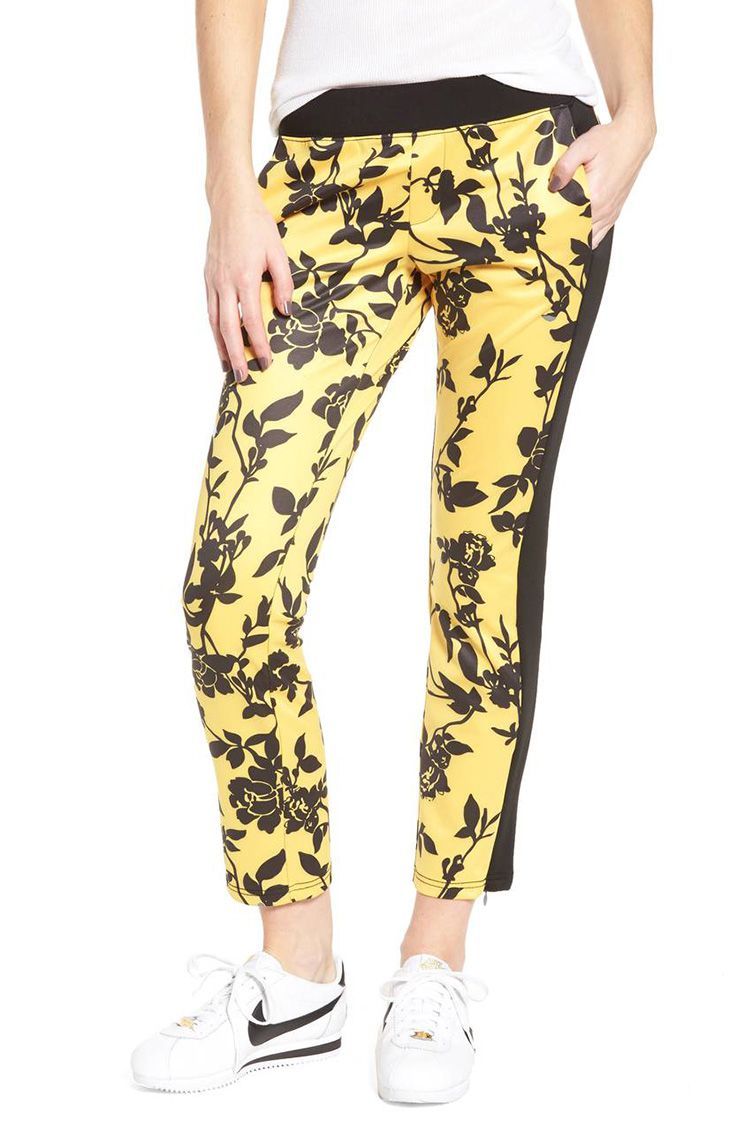 red and yellow track pants