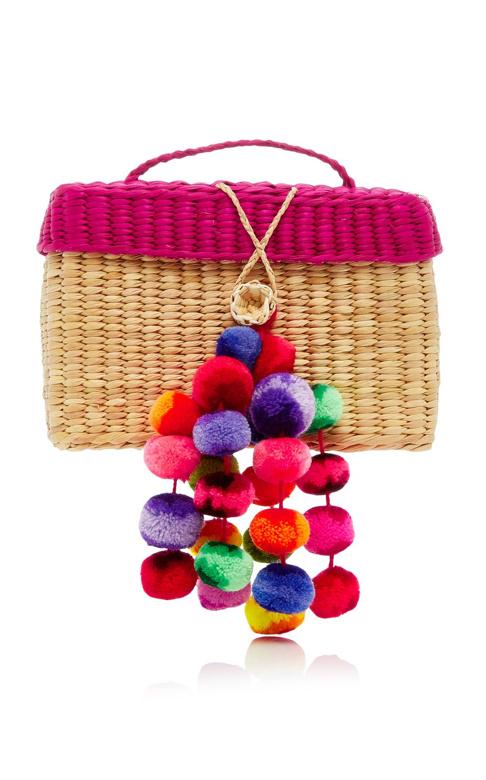 A Baby Straw Bag with Pom Poms to Bring on Your Next Vacation