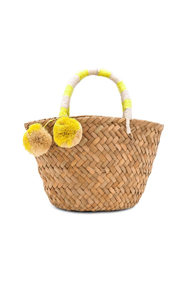 A Mini Straw Tote with Cute Yellow Pom Poms