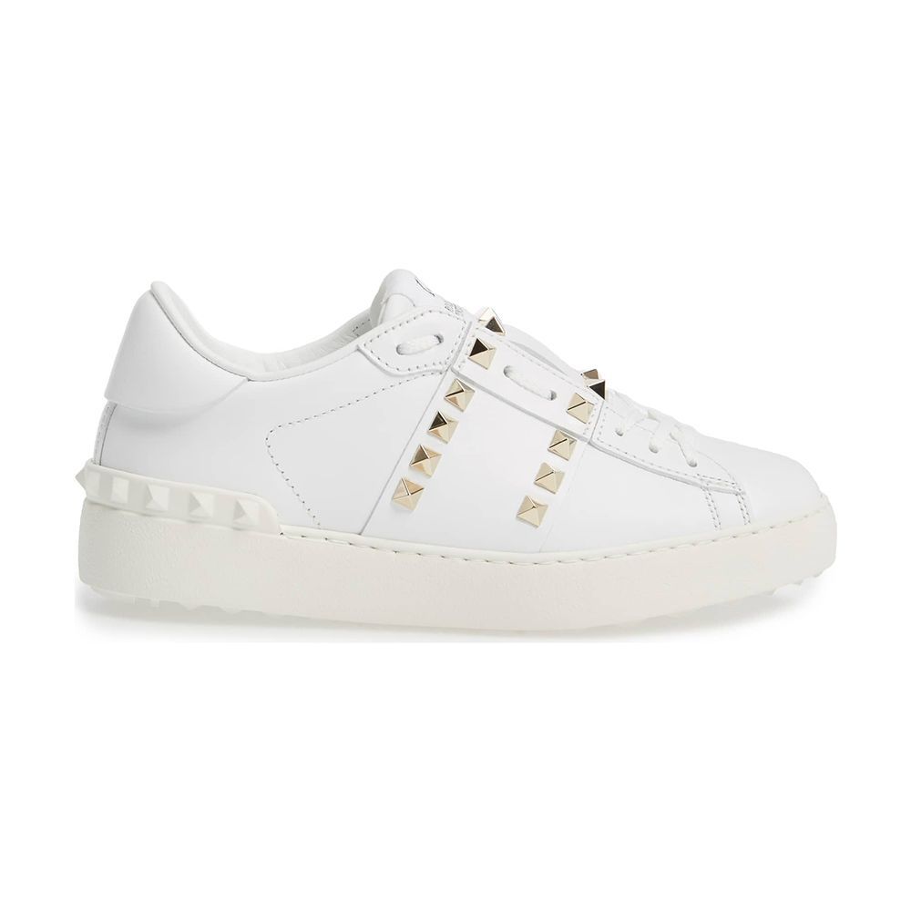 white sneakers with spikes