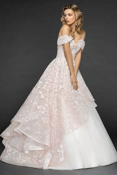 Blush wedding dress store with lace overlay