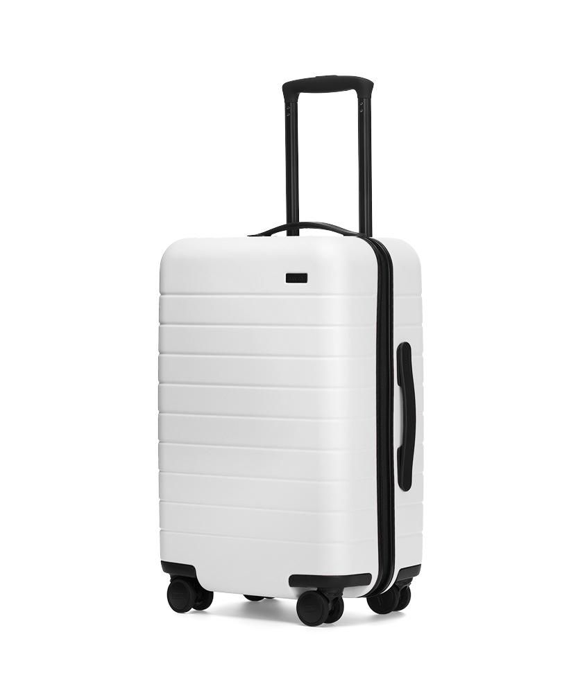 Away luggage cheap white dirty