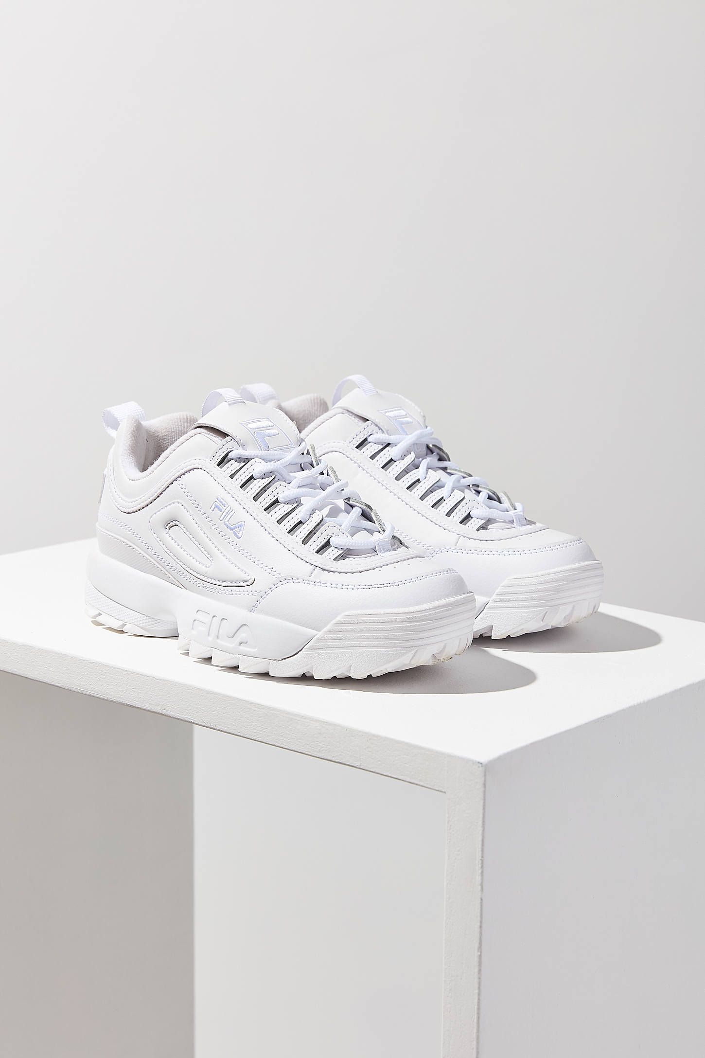 Fila disruptor vs adidas falcon sales