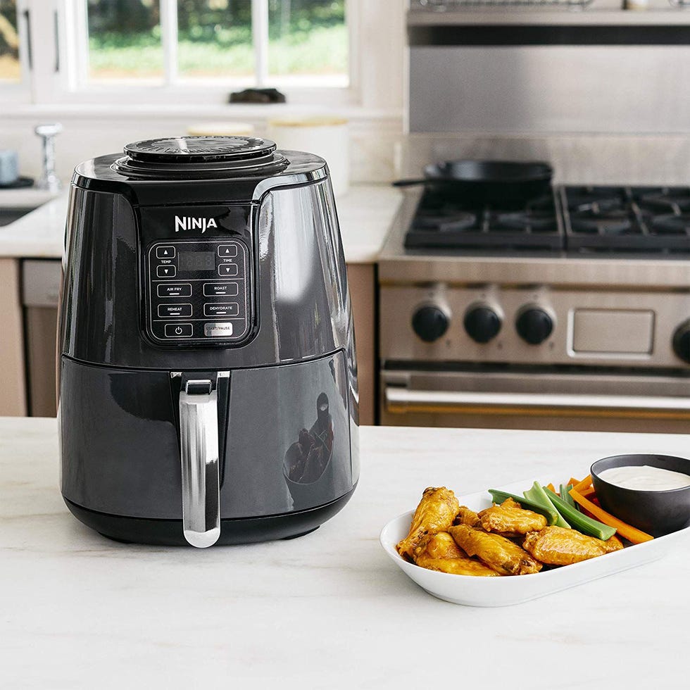 https://hips.hearstapps.com/vader-prod.s3.amazonaws.com/1561662775-ninja-air-fryer-1561662750.jpg?crop=0.669xw:1.00xh;0.0375xw,0&resize=980:*