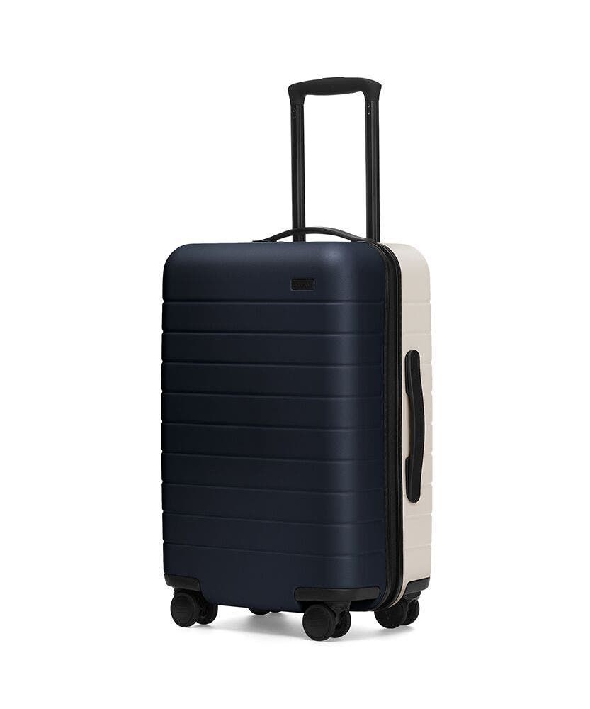 Navy away suitcase on sale