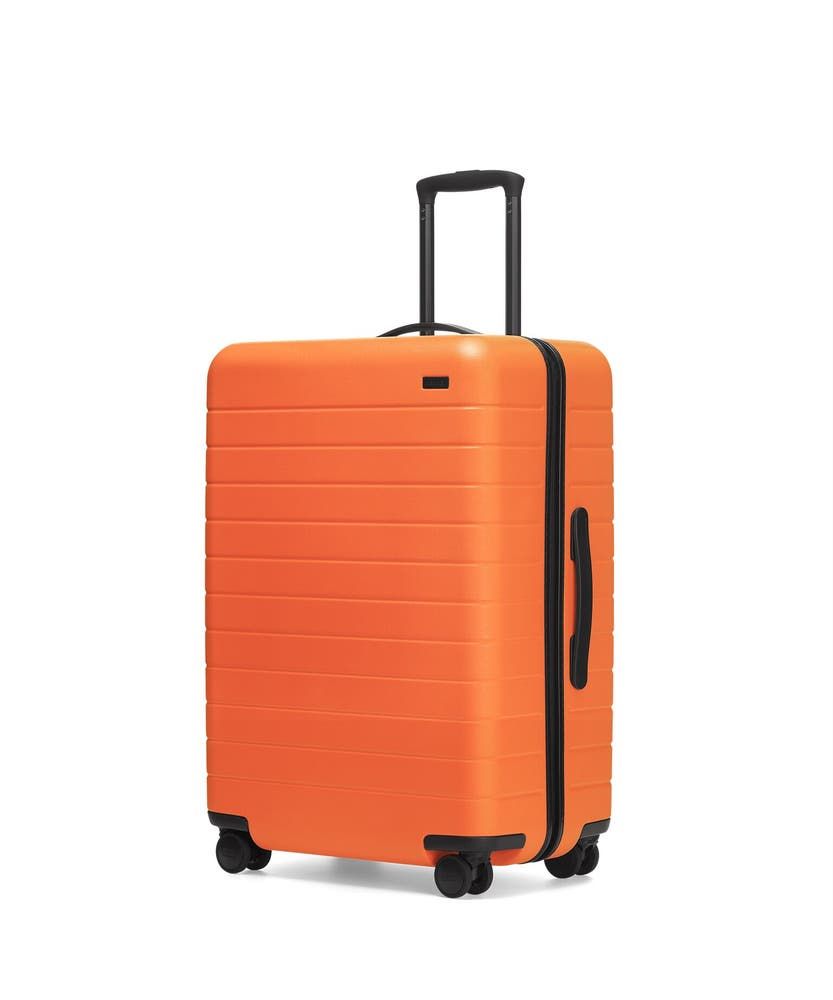 away orange suitcase