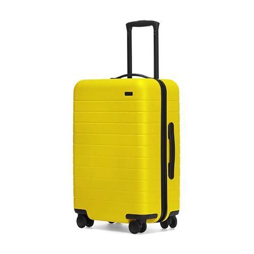 away suitcase yellow