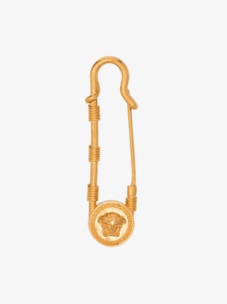 Versacegold tone medusa safety pin brooch