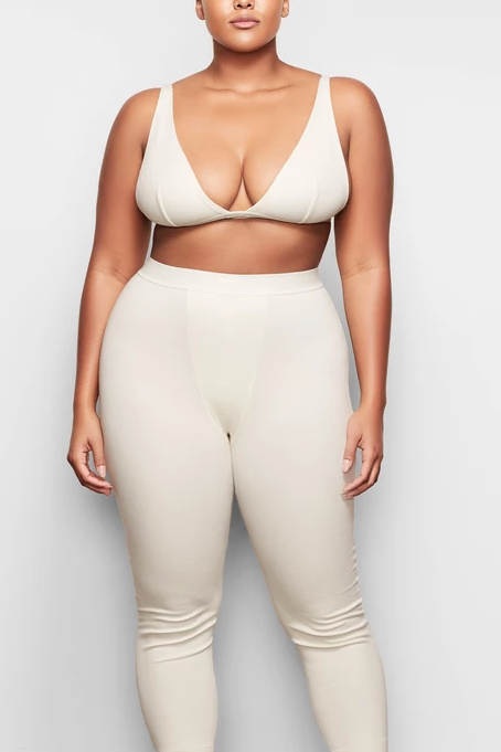Skims Cotton Balconette Bra in Bone, Kim Kardashian Launches Cotton Skims  Collection, and TBH, It Looks a Lot Like Her Everyday Clothes