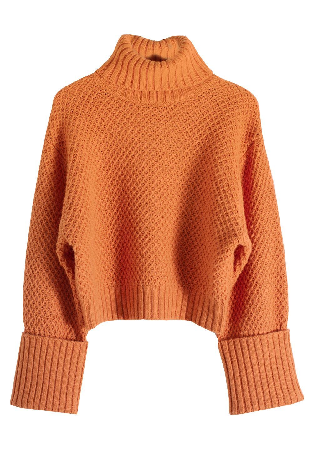 an orange sweater