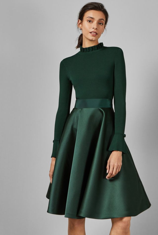 The Duchess of Cambridge wears dark green dress by Beulah