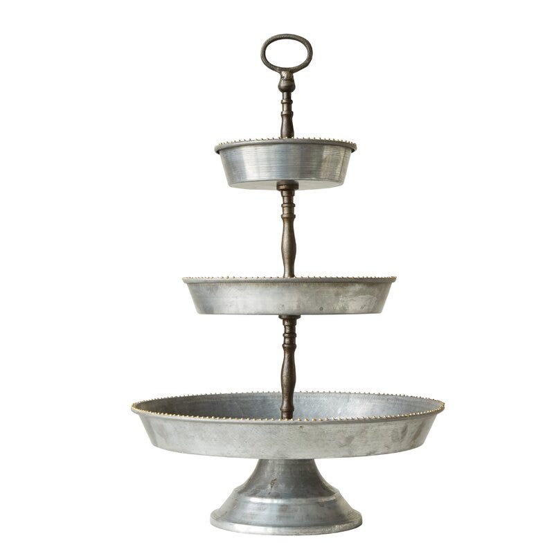 Stack your products on a cupcake stand. 