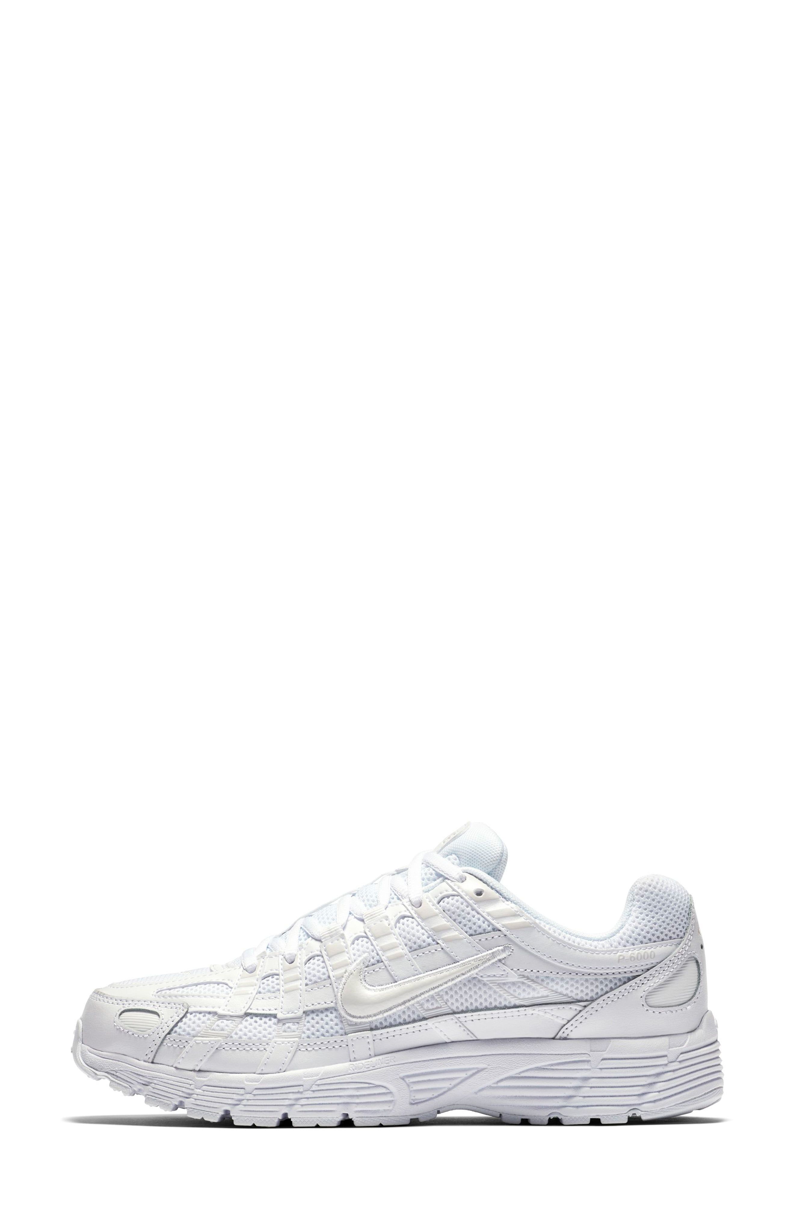 white leather sport shoes