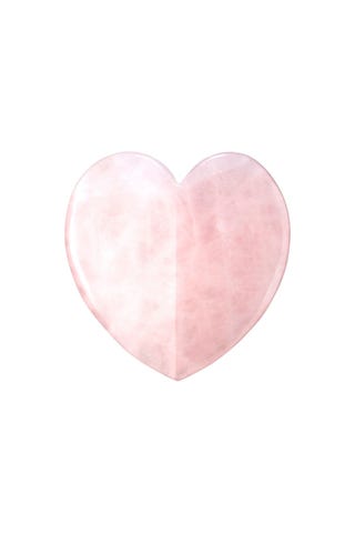 Gua Sha facial au coeur de quartz rose