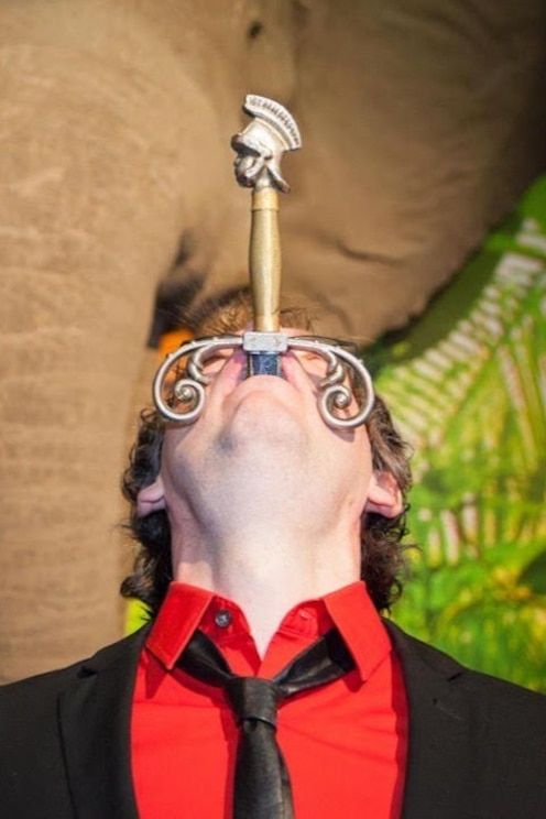 Sword Swallowing with a Medical Clown