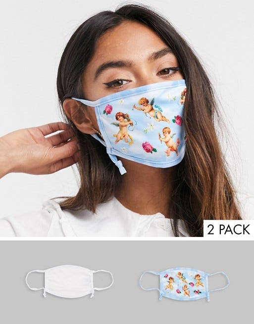 Skinnydip Exclusive 2 pack face coverings with adjustable straps in plain white and cherub print