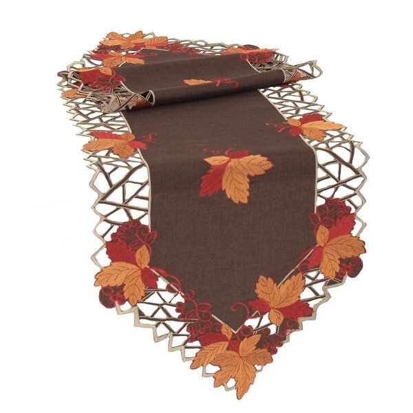 https://hips.hearstapps.com/vader-prod.s3.amazonaws.com/1597955985-weinberger-embroidered-cutwork-fall-table-runner.jpg?crop=1xw:1.00xh;center,top&resize=980:*