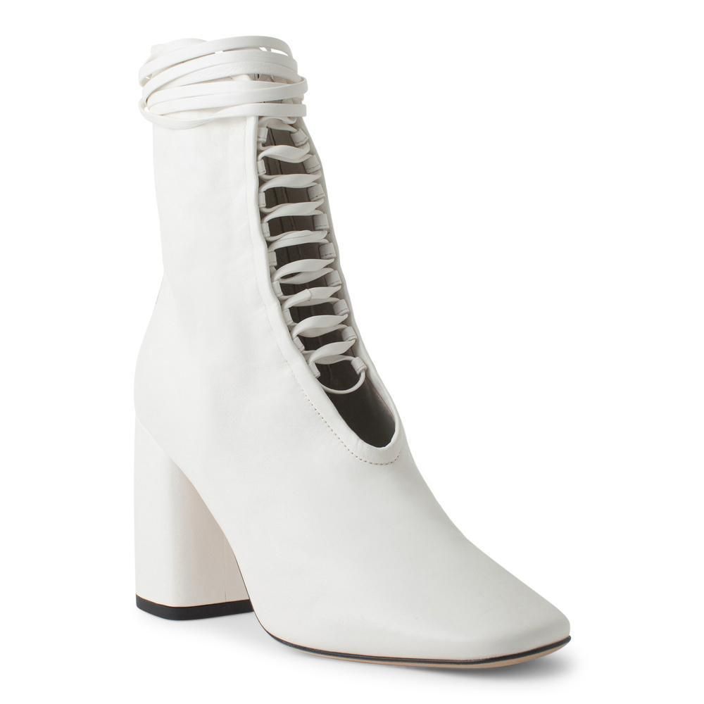 Buy > white leather boots > in stock