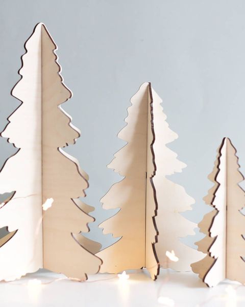 15 Wooden Christmas Trees To Buy This Festive Season