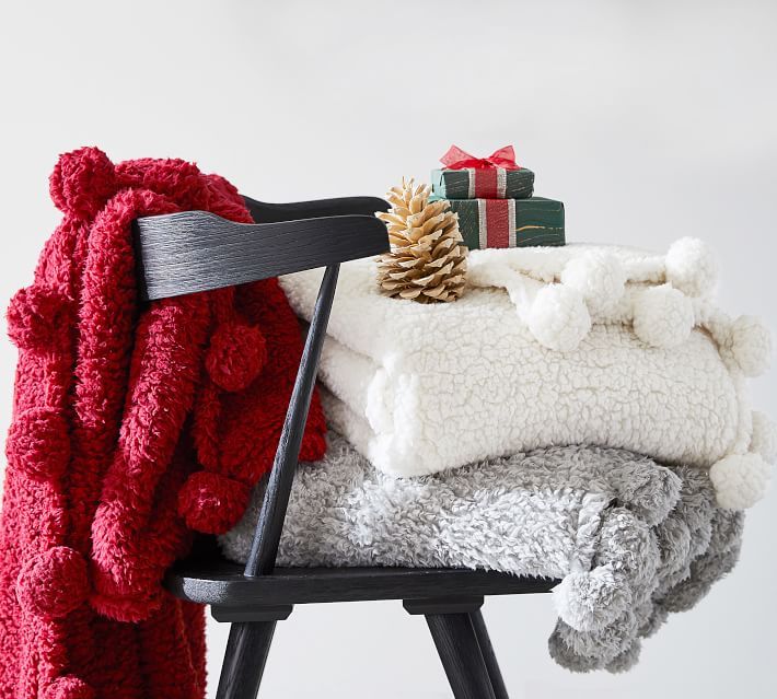 Pottery barn cozy pom pom 2024 throw