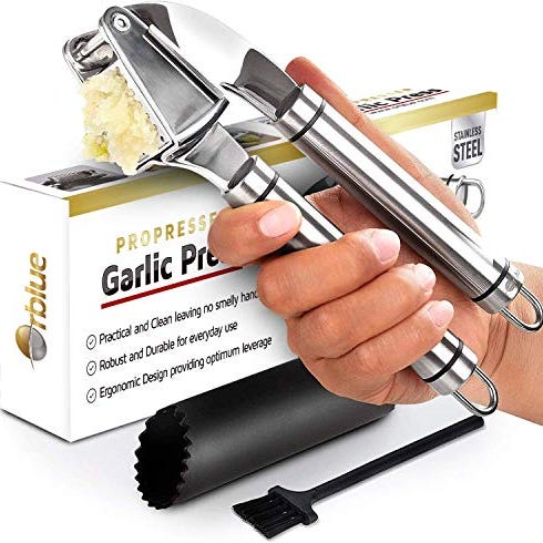 The 12 Absolute Best Uses For Your Garlic Press