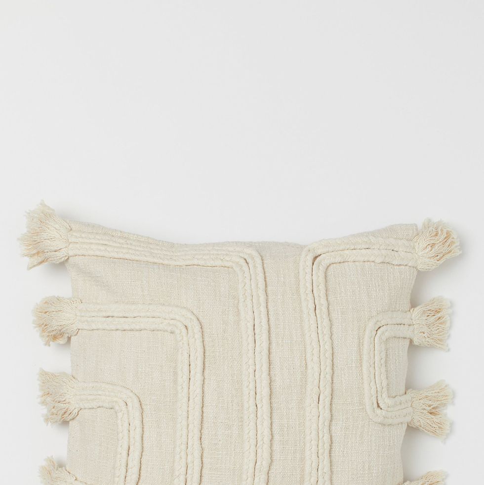 Tasselled cushion cover