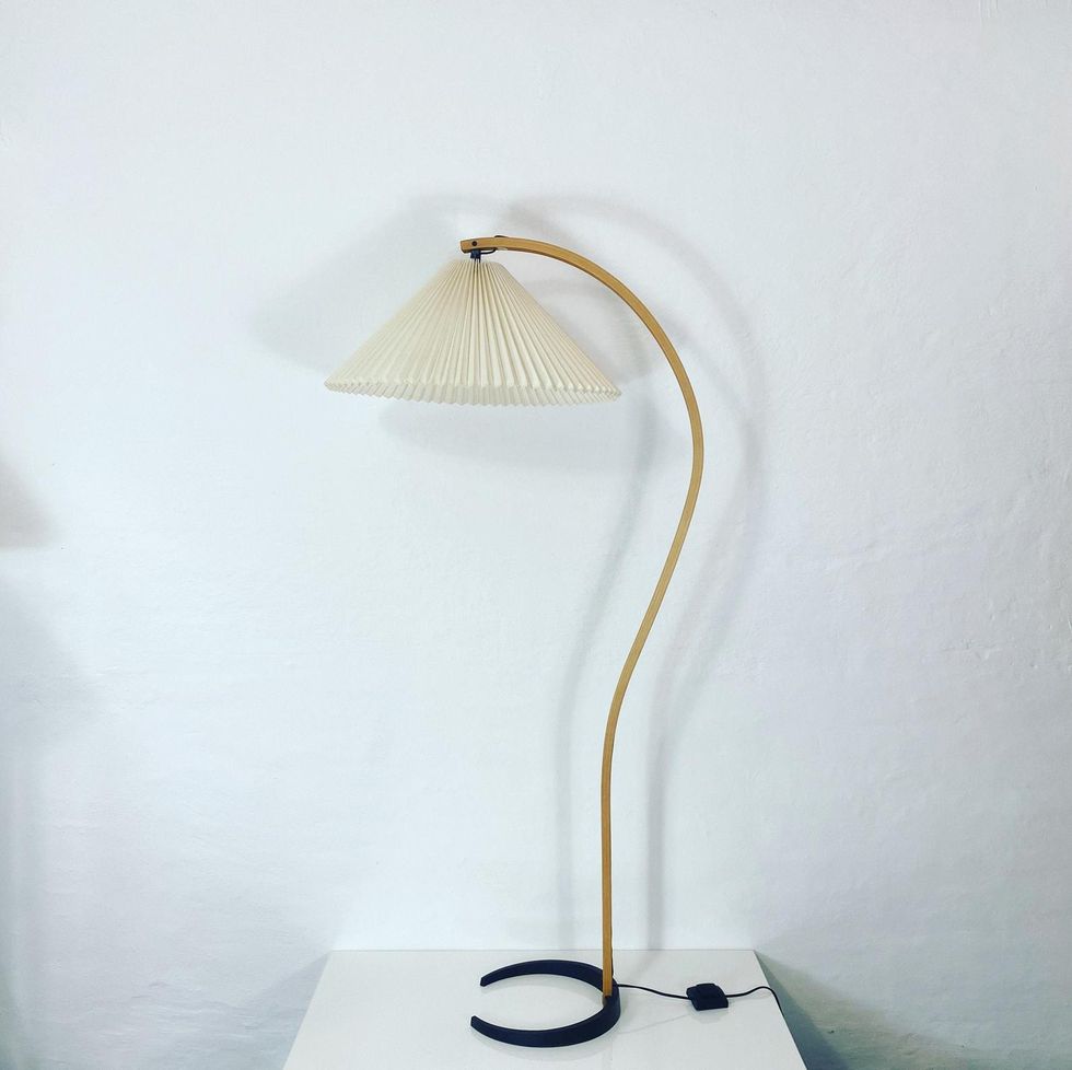 An original Caprani floor lamp with the original shade