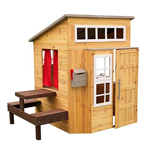 wooden outdoor playhouse with kitchen