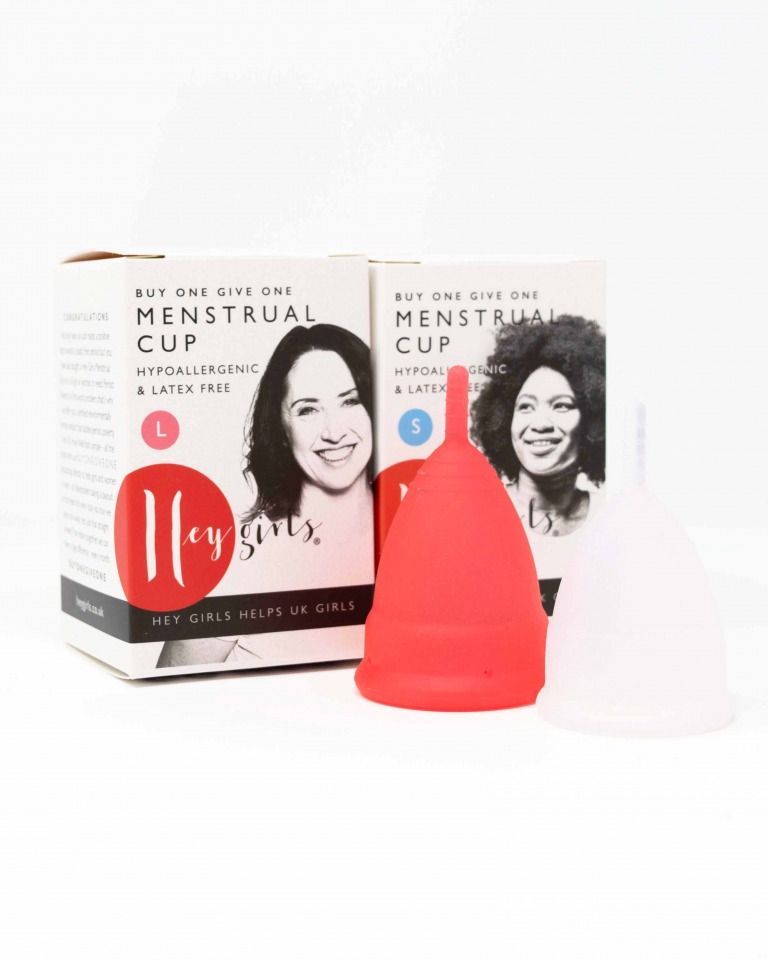 Feminine menstruation cup set. Different sizes of cups S, M, L, XL
