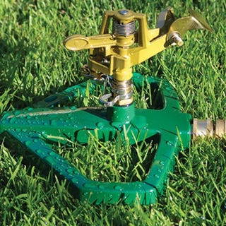 Metal base pulsating sprinkler