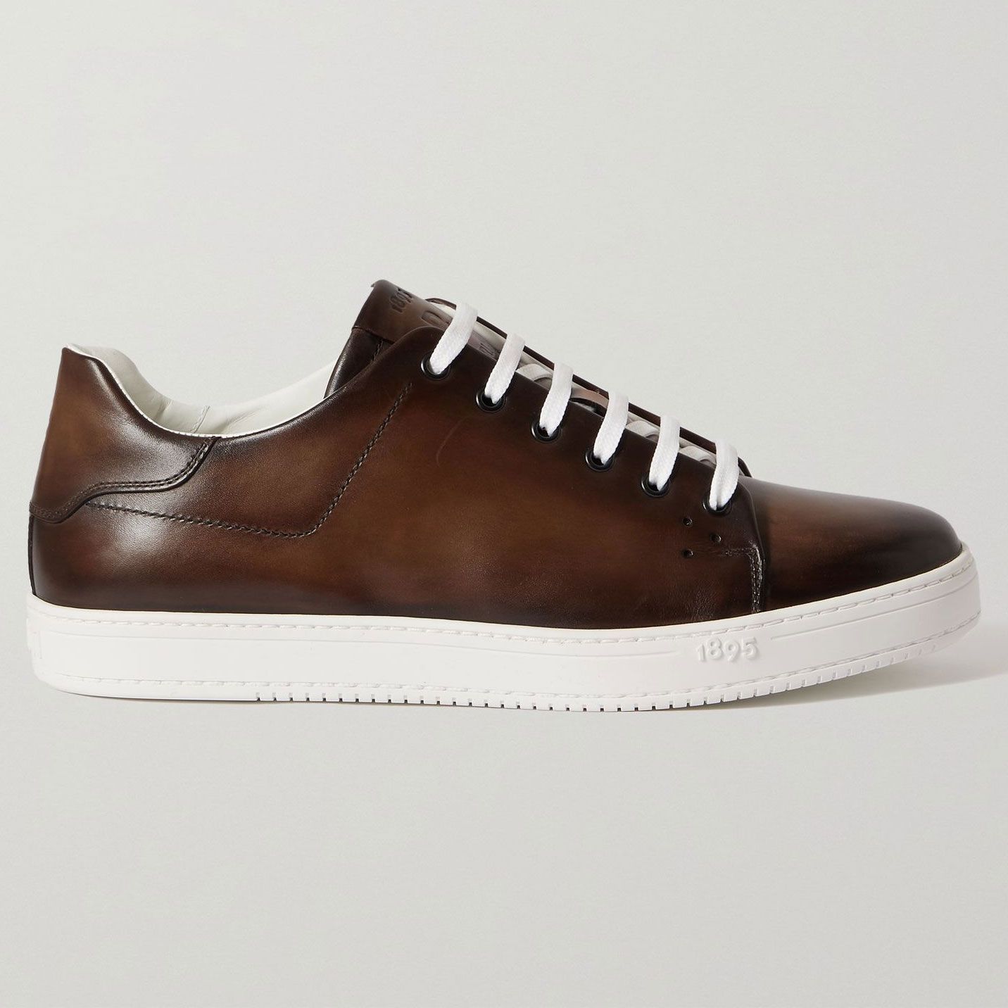 Buy > designer leather sneakers > in stock