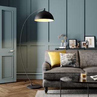 Curved floor lamp Jonera, black and gold