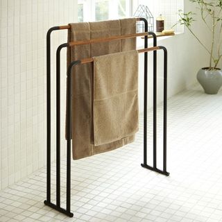 Black freestanding towel rack