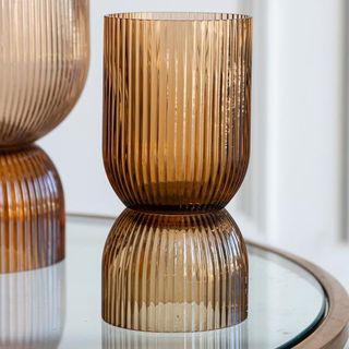 Small shaded brown vase and candle holder