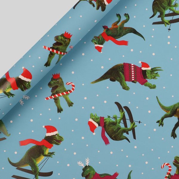 Skiing dinosaurs Christmas wrapping paper 