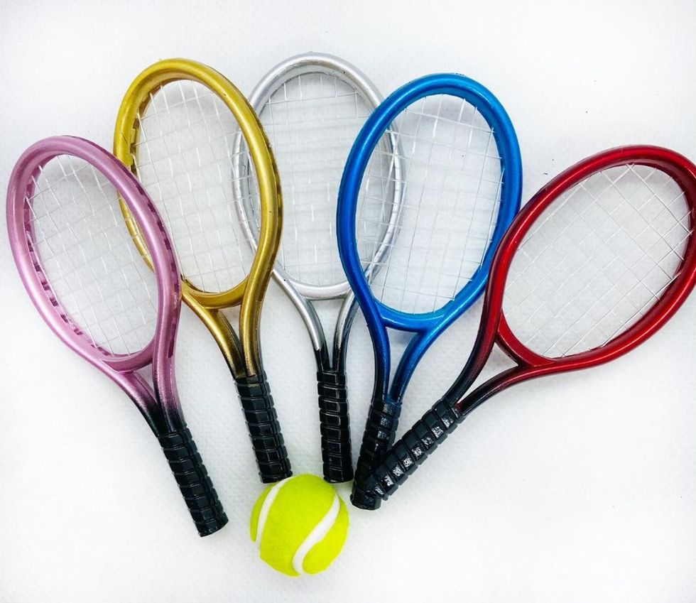 Elf-Sized Tennis Racket and Tennis Ball