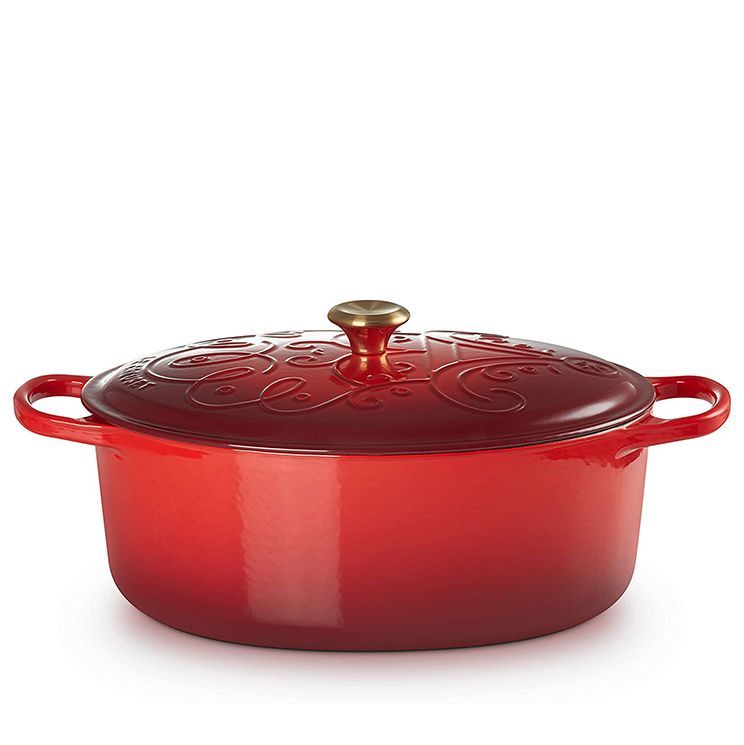 https://hips.hearstapps.com/vader-prod.s3.amazonaws.com/1638208362-le-creuset-enameled-cast-iron-noel-collection-signature-oval-dutch-oven-1638208347.jpg?crop=0.745xw:0.745xh;0.136xw,0.0737xh&resize=980:*