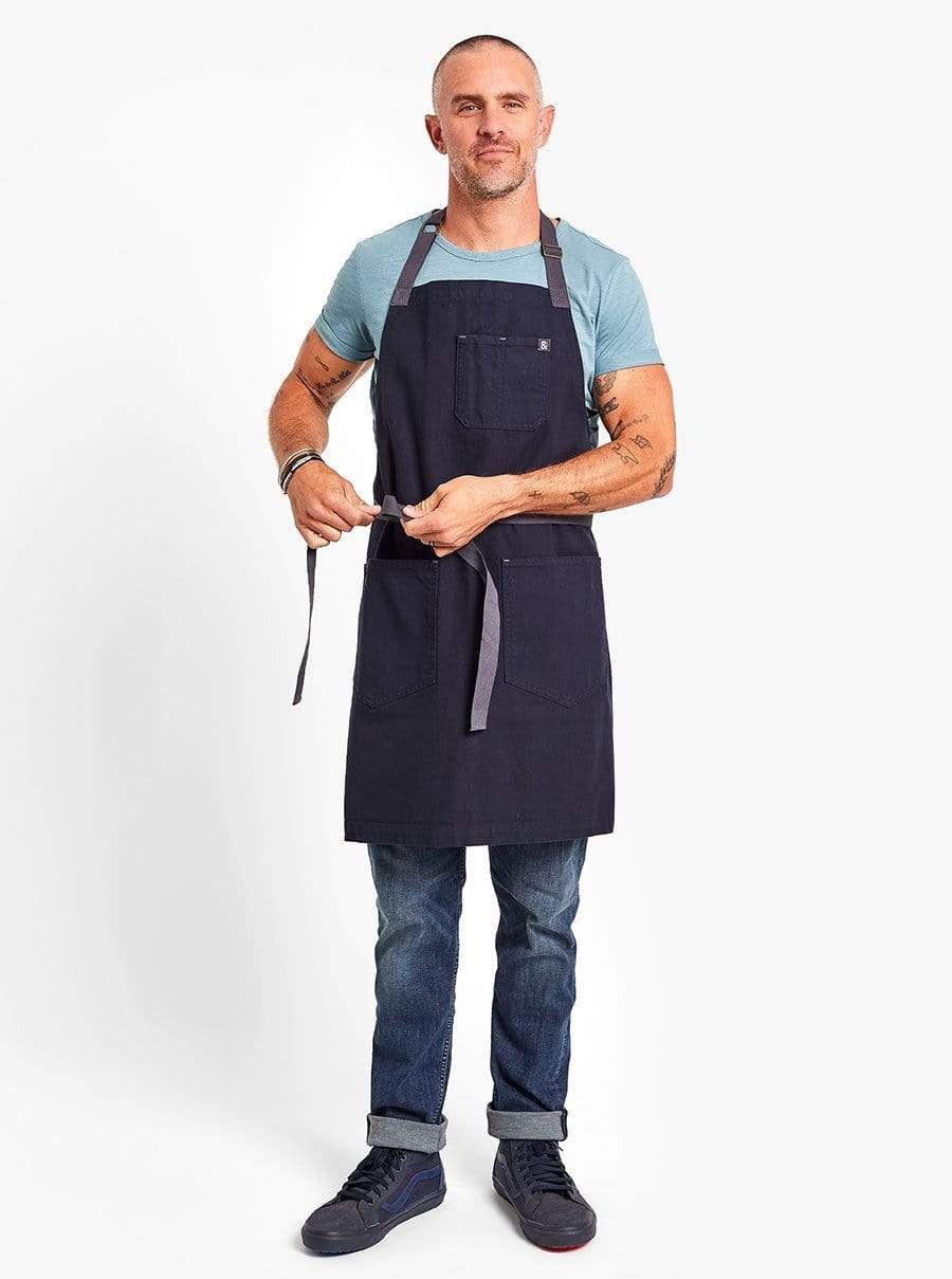 https://hips.hearstapps.com/vader-prod.s3.amazonaws.com/1638751184-valentines-gifts-for-men-essential-apron-1638751129.jpg?crop=0.853xw:0.635xh;0.0689xw,0.154xh&resize=980:*