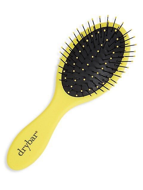 The best travel-size hairbrush: Drybar Lil’ Lemon Drop Daily Detangler
