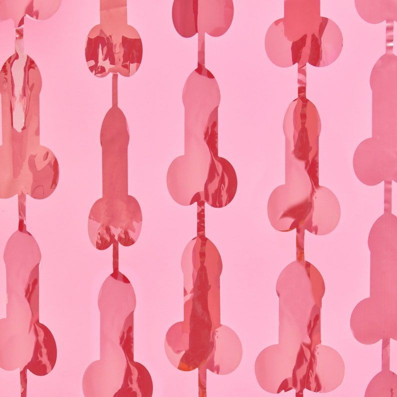 https://hips.hearstapps.com/vader-prod.s3.amazonaws.com/1640015229-penis-decorations-rose-gold-bachelorette-party-penis-foil-curtain-1640015216.jpg?crop=1xw:0.7995971802618328xh;center,top&resize=980:*