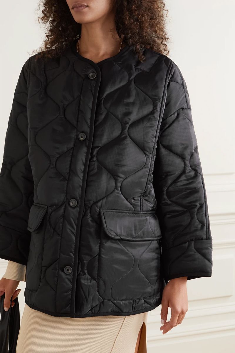 black collarless quilted jacket