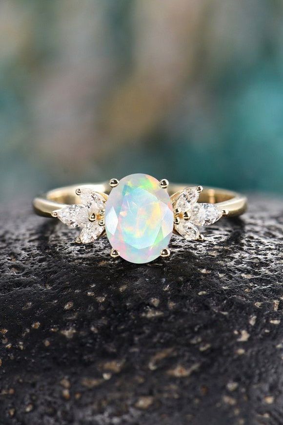 Vintage oval cut opal engagement ring: Unique engagement rings
