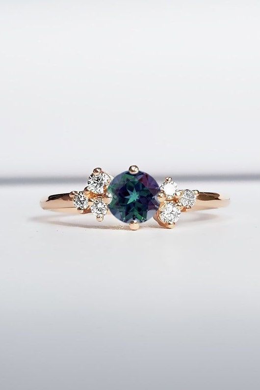 Alexandrite and diamond cluster engagement ring: Unique engagement rings