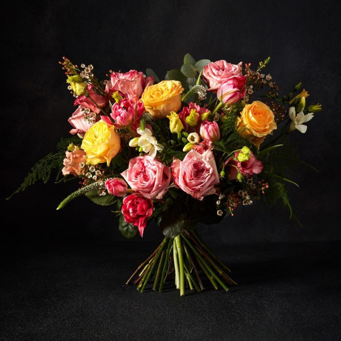 bunch of flowers with black background