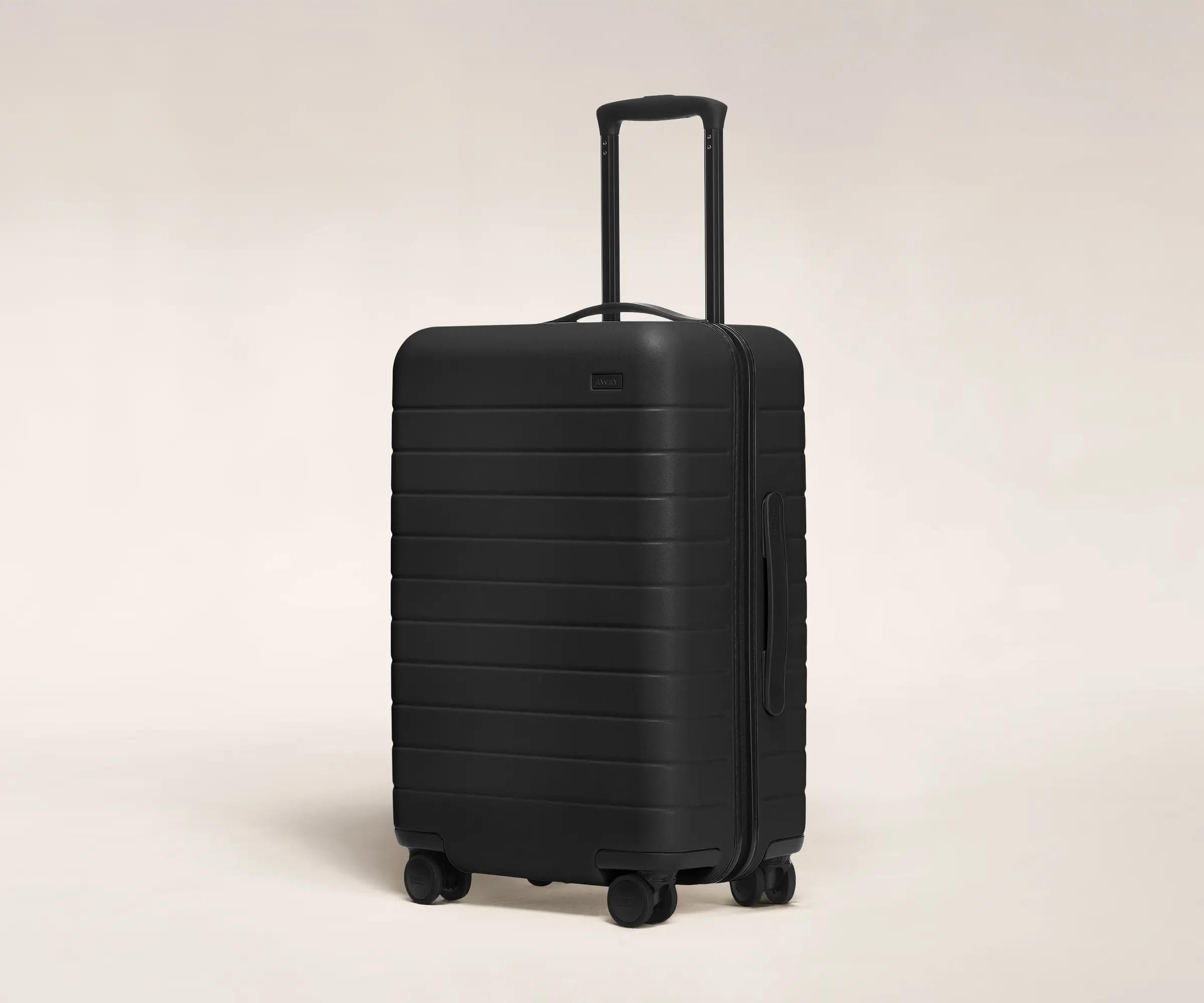 Away Large Flex suitcase review: I moved to another country and fit  everything into this case | CN Traveller