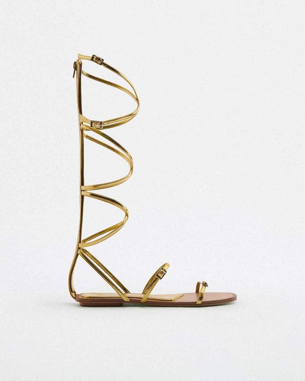 Sandalias romanas doradas