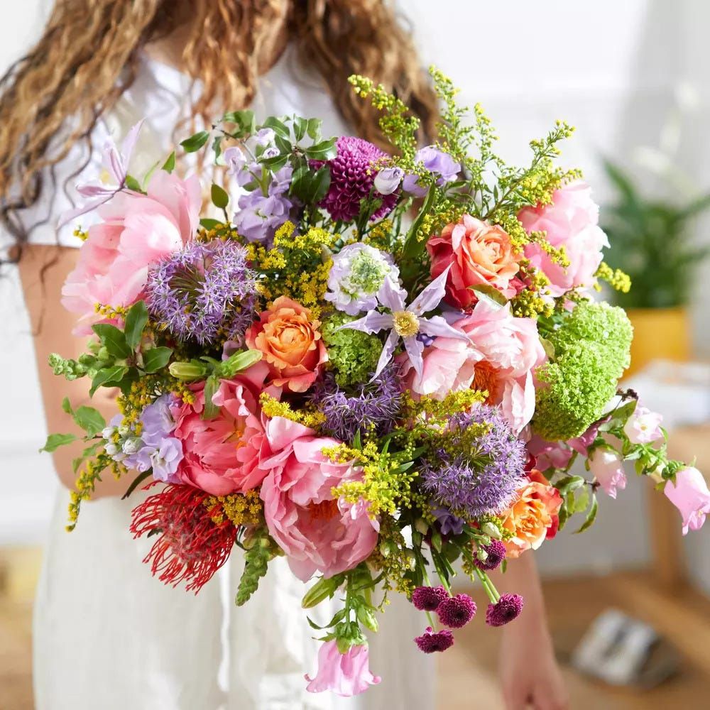 peonies and delphinium bouquet