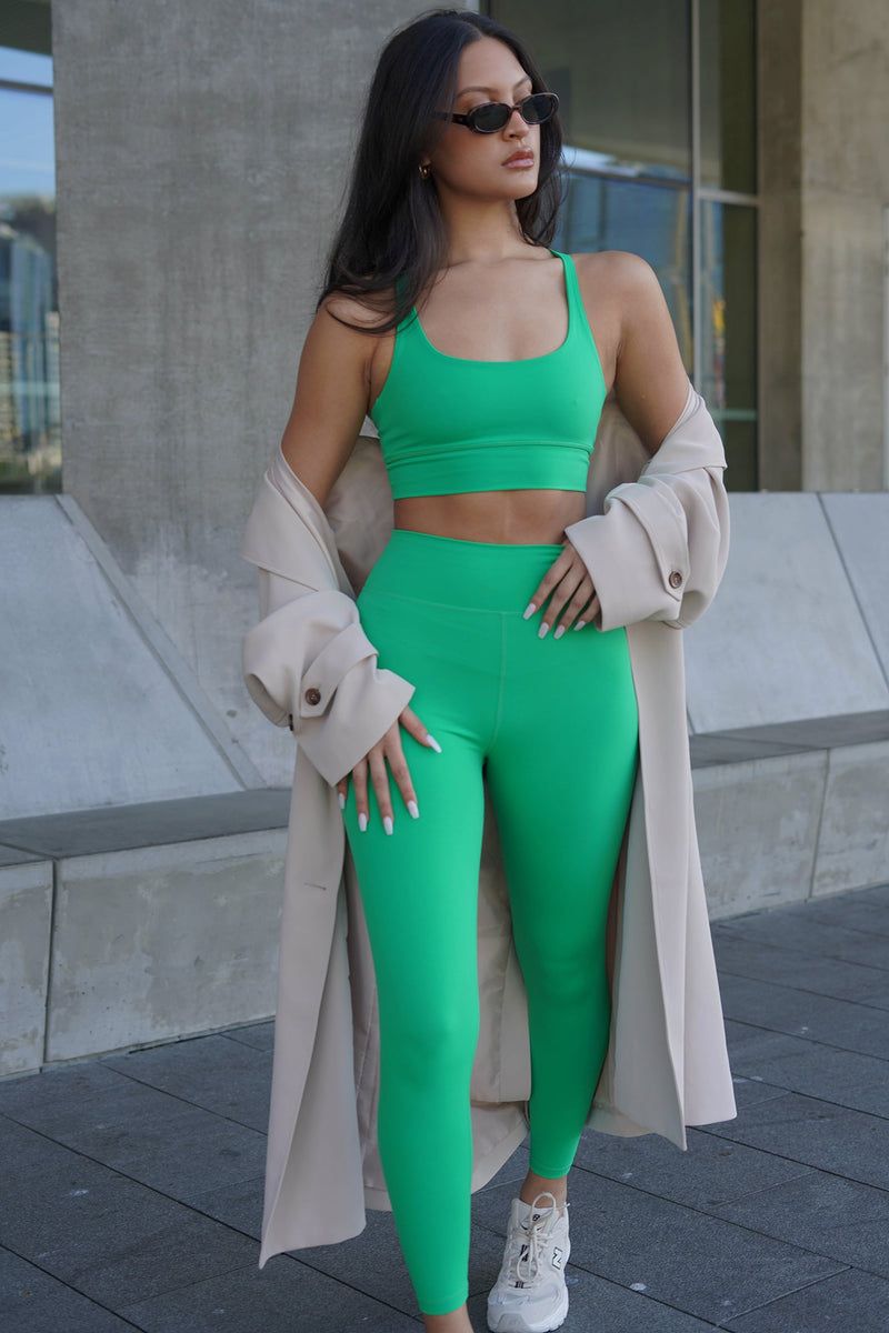 Kendall Jenner in green sweatshirt and green leggings on March 10 ~ I want  her style - What celebrities wore and where to buy it. Celebrity Style