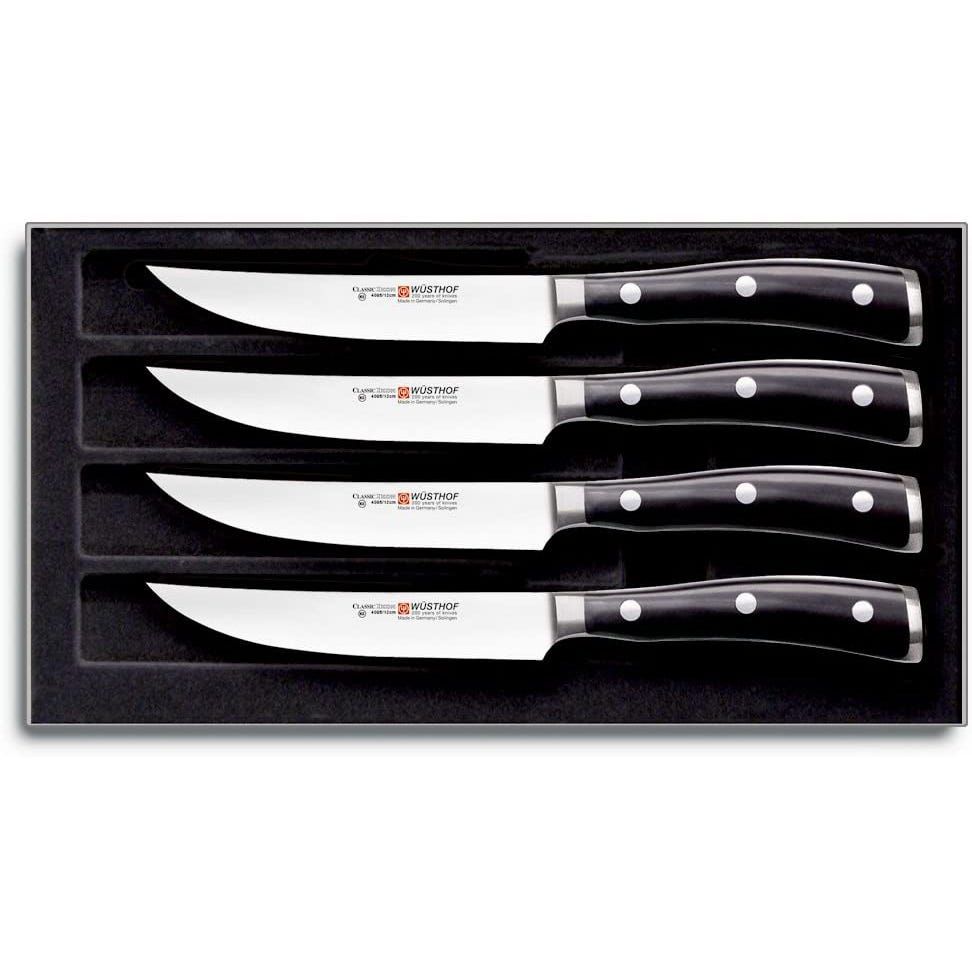 4 Oneida Edge Plus steak knives High Carbon Stainless Steel Blade Black  Handle